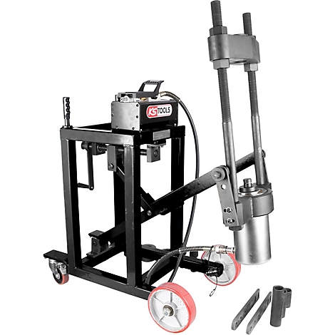 Werkzeug zum Ausdrücken von Buchsen. Schwarze Stahlkonstruktion auf Rädern, Hydraulikzylinder. Das Logo von KS Tools ist sichtbar.